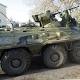 Ukraine crisis: Shots fired as Crimean base stormed by Russian armour