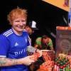 Ed Sheeran hands out pies to Ipswich Town fans