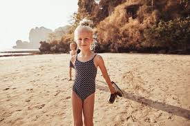 nudist little girl|Premium Photo | Cute little girl on the beach