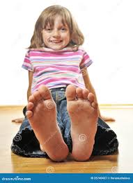 girl preteen soles|Girl lying on back sunbathing, focus on bare feet - Stock Photo - Dissolve