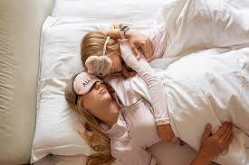 Young woman using smart phone and going to sleep in bedroom at night jpg x Sleeping mom and step son