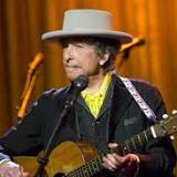 Bob Dylan apologises after machine used to 'sign' books worth more than £500