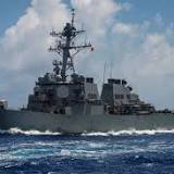 China says it drove away US destroyer that sailed near disputed isles