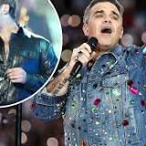 AFL in talks with pop superstar Robbie Williams about performing in its half time Grand Final show