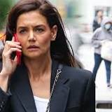Katie Holmes showcases her bold fashion sense in billowing jeans and cropped black blazer as she steps out in NYC