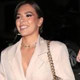 Gemma Owen looks chic in a statement belted blazer from her debut PrettyLittleThing edit as she attends her glitzy ...