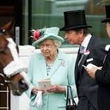Peter Phillips dodges the raindrops with his oil heiress girlfriend Lindsay Wallace on last day of Royal Ascot after she ...