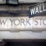 Wall Street mixed after earnings reports