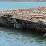 Photos capture Lake Mead's boat graveyard as water levels shrink to record low