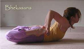 Frog Pose.Lying on belly, using the hands to hold the feet in the position they'd have in virasana

