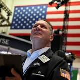 US STOCKS-Wall Street closes down on slide in Apple shares, bank stocks