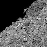 NASA Spacecraft Investigates Bennu Asteroid