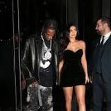 Kylie Jenner shows some skin in revealing black mini dress