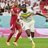 Soccer-Senegal lead Qatar at halftime in pivotal World Cup group game