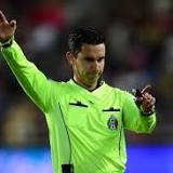 Who is the referee for Belgium vs. Morocco Group F match?